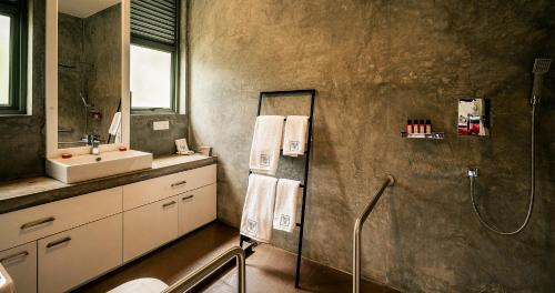 a bathroom with a shower and a sink at Villa 98 in Malabe