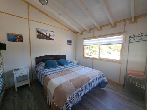 Ένα ή περισσότερα κρεβάτια σε δωμάτιο στο Cabaña 2 Atardecer Fandango