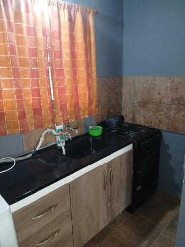 Kuchyň nebo kuchyňský kout v ubytování Casa quinta barrio real