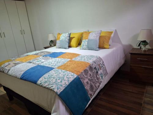 Ένα ή περισσότερα κρεβάτια σε δωμάτιο στο Departamento en Pichilemu