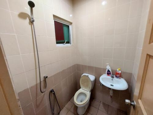 Ένα μπάνιο στο AIN's HOMESTAY