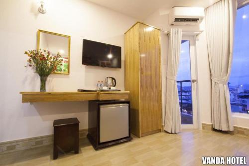 Kuchyň nebo kuchyňský kout v ubytování VANDA Hotel Nha Trang
