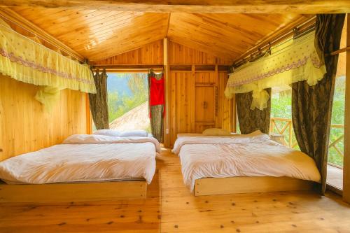 Postel nebo postele na pokoji v ubytování Tả Mẩy Homestay