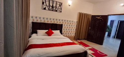 Postel nebo postele na pokoji v ubytování Rose Inn