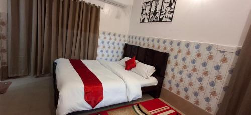 Postel nebo postele na pokoji v ubytování Rose Inn