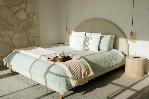 Postel nebo postele na pokoji v ubytování Coast