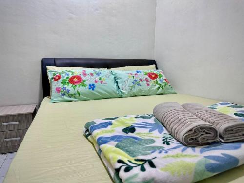 Ένα ή περισσότερα κρεβάτια σε δωμάτιο στο The Cozy Inn