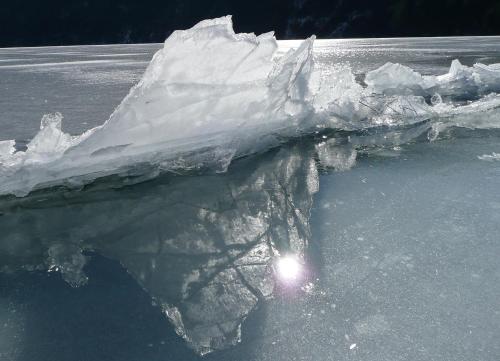 a large chunk of ice on the water at Ferienhaus Knaller in Weissensee