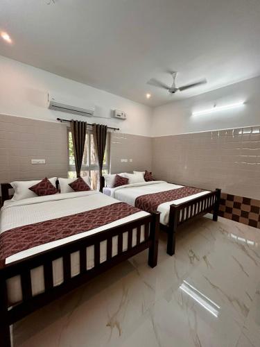 Ένα ή περισσότερα κρεβάτια σε δωμάτιο στο De villa Auro