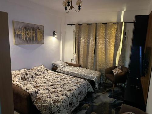 Ένα ή περισσότερα κρεβάτια σε δωμάτιο στο The HQ