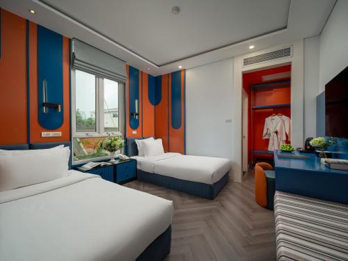 Postel nebo postele na pokoji v ubytování Minerva Church Hotel