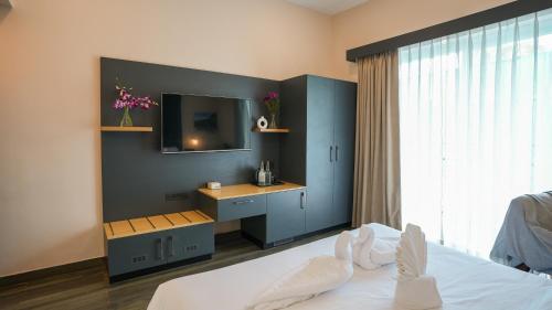 Postel nebo postele na pokoji v ubytování Surf and Sand