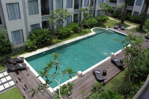 an overhead view of a swimming pool in a building at Umalas Apartment in Seminyak