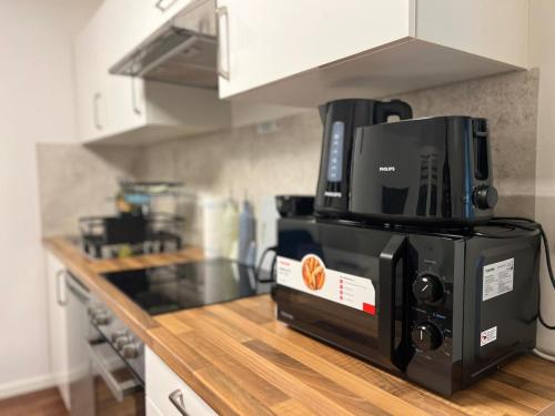 a coffee maker sitting on top of a kitchen counter at Apartments Königstein im Taunus in Königstein im Taunus