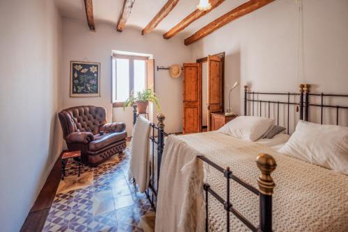 Postel nebo postele na pokoji v ubytování Cal Guixater