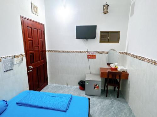 Μια τηλεόραση ή/και κέντρο ψυχαγωγίας στο nhà nghỉ thanh thuy 2