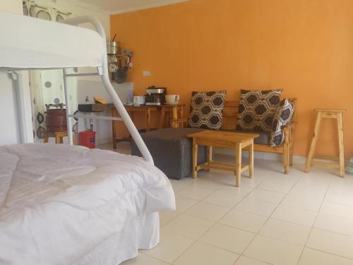 Postel nebo postele na pokoji v ubytování Kakamega Forest Glamping Cabin