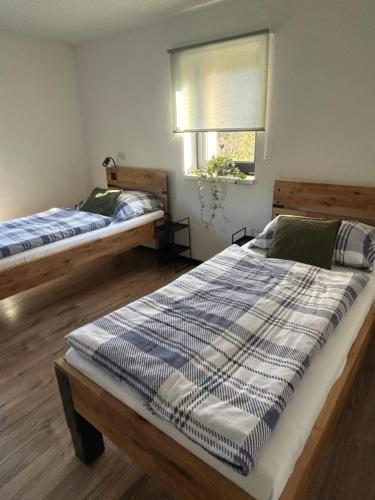 Ένα ή περισσότερα κρεβάτια σε δωμάτιο στο Apartman nad Metují