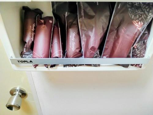 a drawer of a cupboard filled with someones clothes at Ito - Cottage - Vacation STAY 19055 in Ito