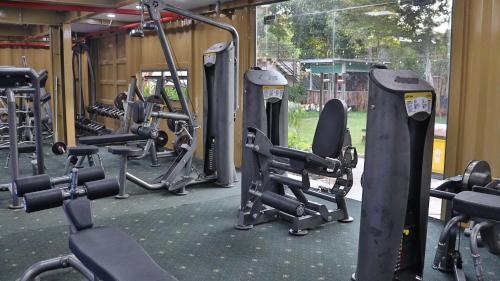 a gym with several rows of exercise bikes at NV Sport Camping & Hotel - Ho Tram in Xuyên Mộc