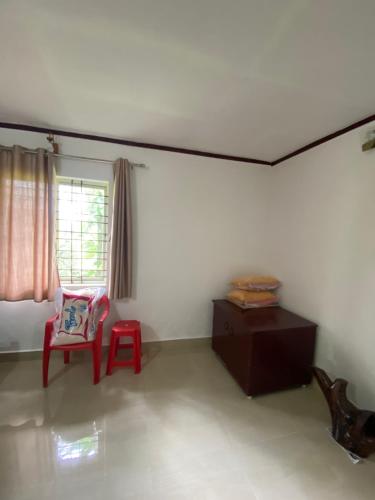 Un lugar para sentarse en Coorg jungle Cottage