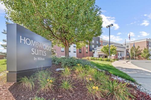 a sign for the homewood suites by hilton building at Homewood Suites by Hilton Denver Tech Center in Englewood