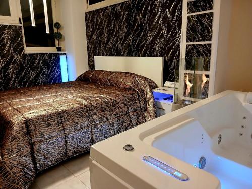 Ένα ή περισσότερα κρεβάτια σε δωμάτιο στο Villa Laura Apartment