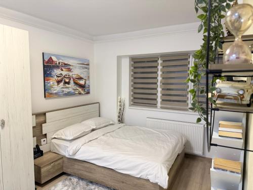 Postel nebo postele na pokoji v ubytování Home away from home - Cozy and Spacious Studio with Balcony