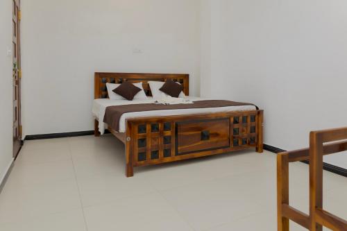 Un pat sau paturi într-o cameră la Blue Horizon Apartments