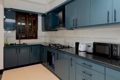 O bucătărie sau chicinetă la Blue Horizon Apartments