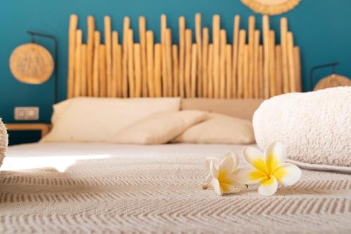 Postel nebo postele na pokoji v ubytování Alma Ventura House - Majanicho