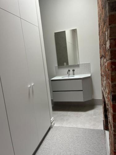 Koupelna v ubytování Gertie, Classic meets Modern with Pako next door