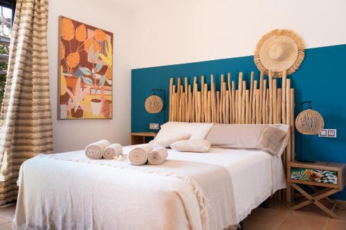 Postel nebo postele na pokoji v ubytování Alma Ventura House - Majanicho