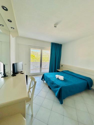 Katil atau katil-katil dalam bilik di Hotel Miralonga