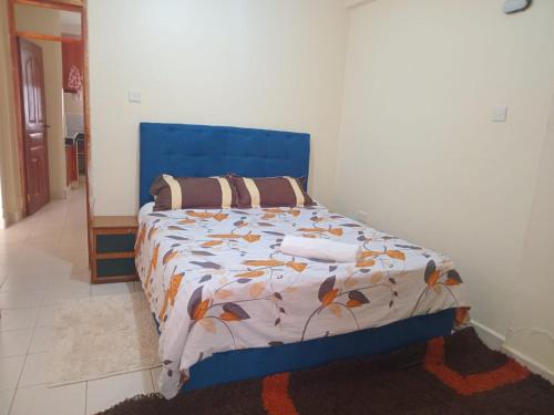 Ένα ή περισσότερα κρεβάτια σε δωμάτιο στο Brames Homes