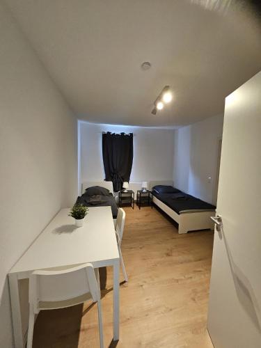 Ένα ή περισσότερα κρεβάτια σε δωμάτιο στο Work & Stay Tailfingen