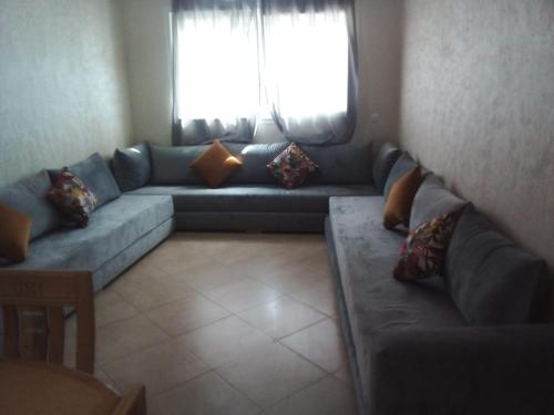 Khu vực ghế ngồi tại BOUZNIKA Appartement