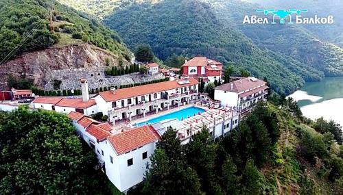 an aerial view of a house on a mountain at Complex Chilingira in Osikovo