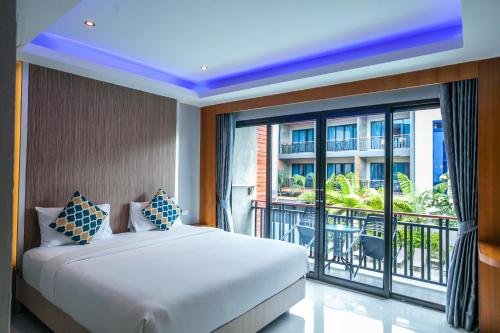 Postel nebo postele na pokoji v ubytování Coco Bella Hotel