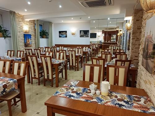 Veitingastaður eða matsölustaður á Aparthotel Adler