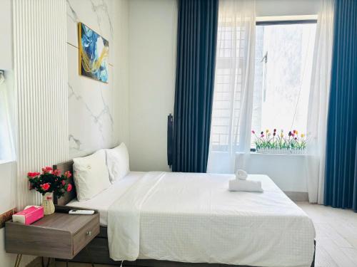 Ένα ή περισσότερα κρεβάτια σε δωμάτιο στο Sunrise Homestay with 4 Bedrooms