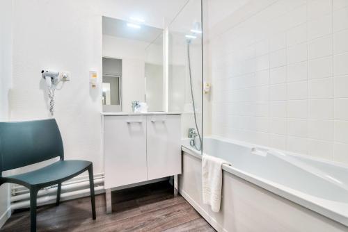 Ένα μπάνιο στο Comfort Aparthotel Toulouse Métropole