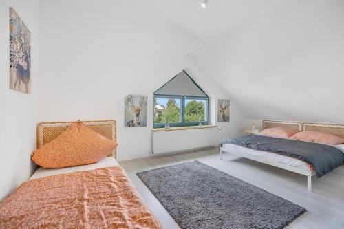 Ένα ή περισσότερα κρεβάτια σε δωμάτιο στο Ruheoase im naturnahem Kurort