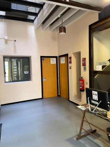 TV a/nebo společenská místnost v ubytování SEVILLE YOUR WAY