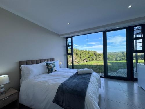 Ένα ή περισσότερα κρεβάτια σε δωμάτιο στο 17 Kromme River Estate