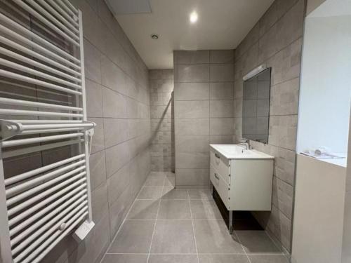 Koupelna v ubytování Le Charlet, Entre Marais et Coeur de ville