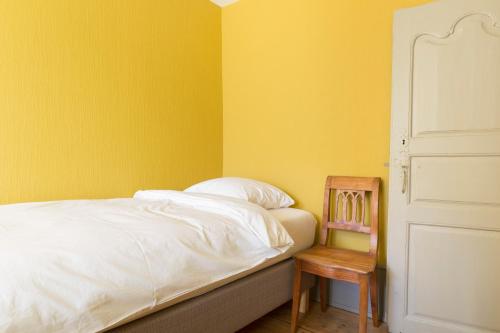 Giường trong phòng chung tại Les Appartements Saint Nicolas