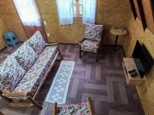 TV a/nebo společenská místnost v ubytování Recanto Mauá - Chalé Amarílis