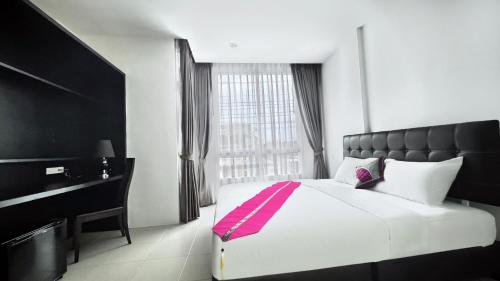 Postel nebo postele na pokoji v ubytování Vi Stay