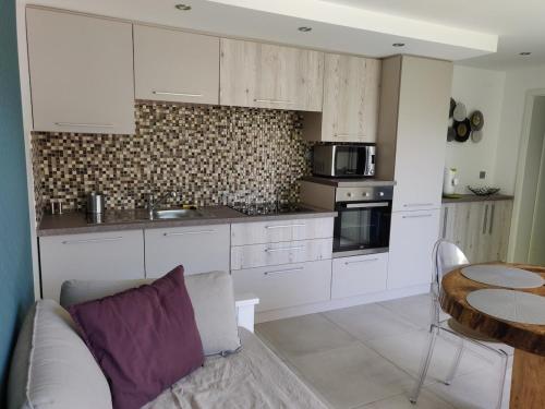 Küche/Küchenzeile in der Unterkunft Au bon repos - Escapade idéale au cœur de l'Alsace